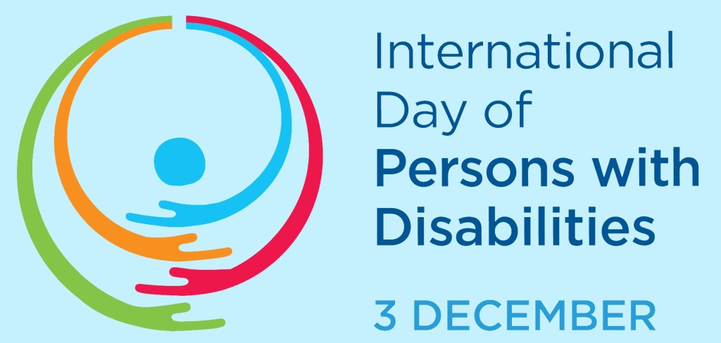 This Image represents International Persons with Disabilities Day. It consists of four stylized hands reaching around a circle representing a head. It says International Day of Persons with Disabilities, 3 December on the right. 